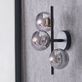 Blair Smoke Glass Ball and Black Metal Wall Light
